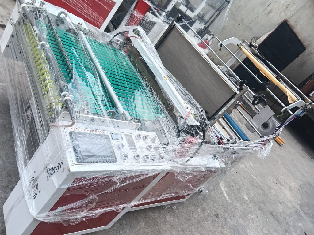 800mm side sealing nylon bag making machine with film folder, feeding rollers and sealing unit for nylon bag production in Nigeria