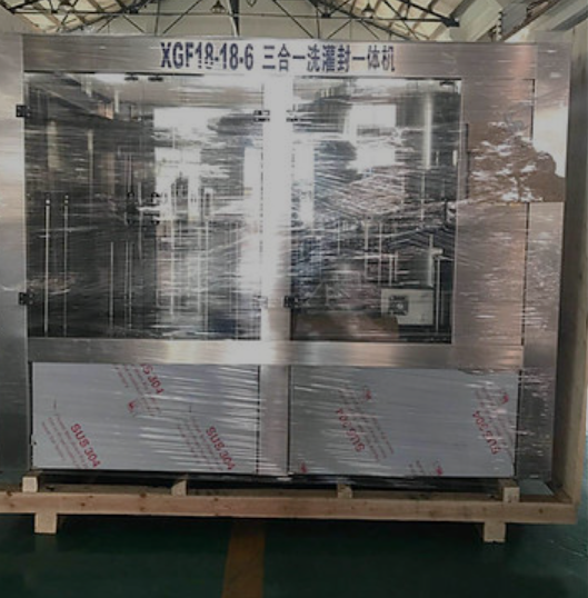 The Automatic Bottle Water Machine XGF 18-18-6 stored in an open wooden box. opened