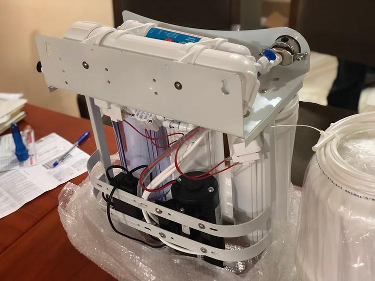 the Under sink domestic reverse osmosis machine on display on a table