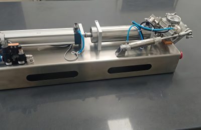 Side view of GC-A liquid filling machine showing stainless steel frame and single nozzle