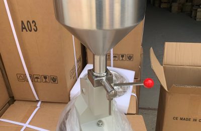 A03 Manual Liquid Filling Machine for 5–50ml bottles, stainless steel piston filler