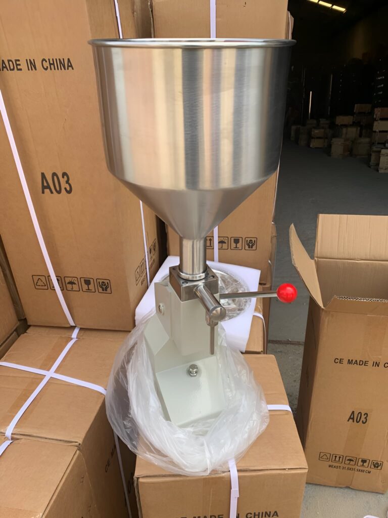 A03 Manual Liquid Filling Machine for 5–50ml bottles, stainless steel piston filler