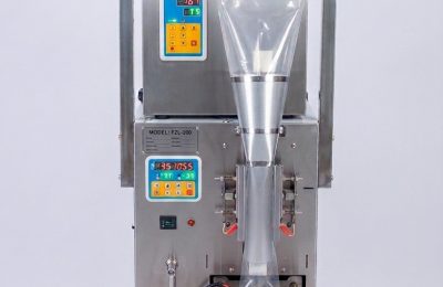 FZL-200 automatic packaging machine for powders and granules displayed with packaged rice, red beans, spices, sea salt, flour, and dried fruit.